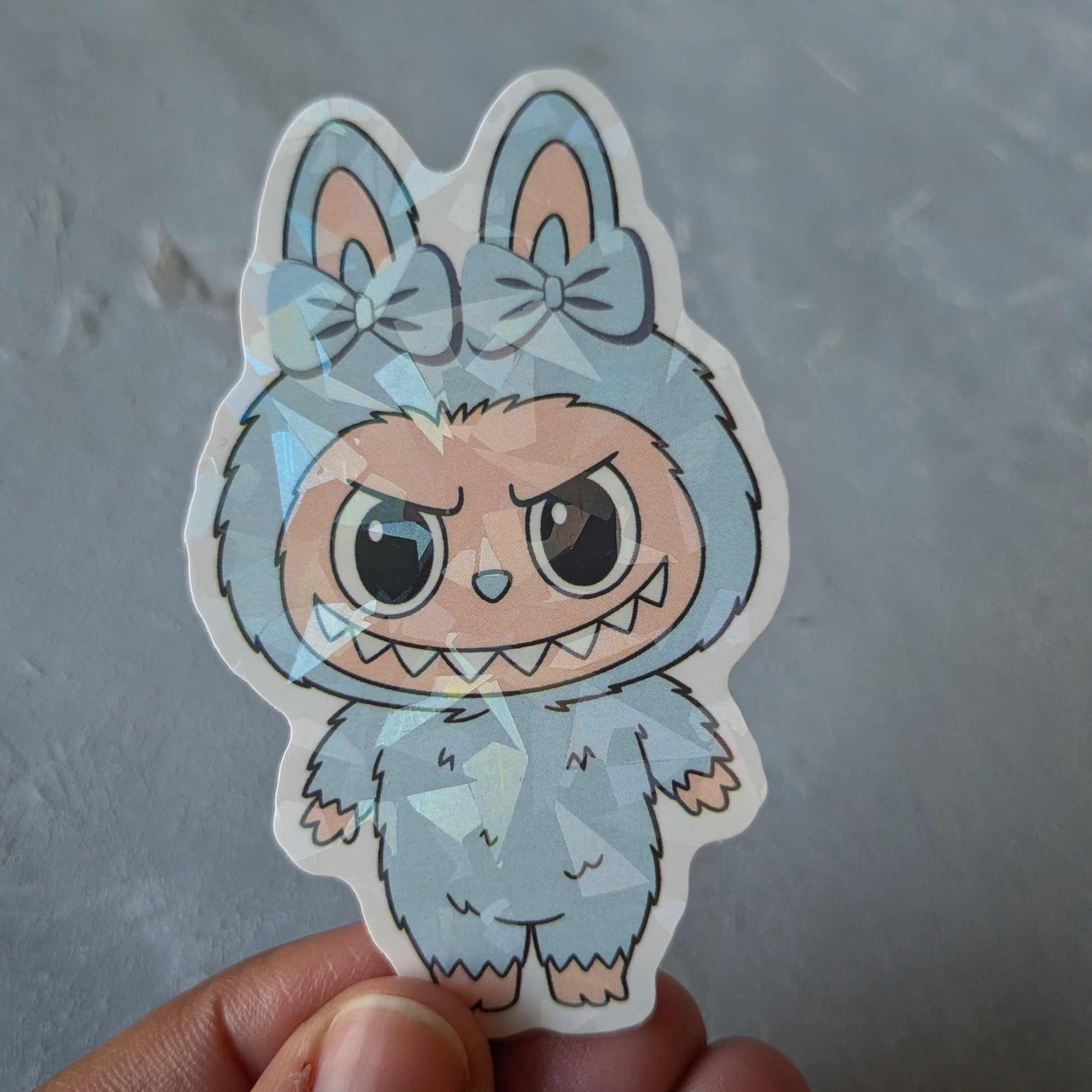 blue monster doll holo sticker